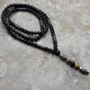 Collane con ciondolo Design Ematite da uomo nera naturale che intaglia Collana di perline di Buddha Goccia di gioielli di moda