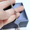 Diseñador de trébol de cuatro hojas de lujo Collar Peandant Elegante Diez flores Gargantilla clásica Bling Diamante Piedra púrpura Para mujer Moissanite Cadena Collares Joyería