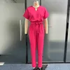 Kvinnors jumpsuits rompers liyong kvinnor jumpsuit mode kort ärm v hals snör upp nippad midja ihålig ut lösa casual byxor romper high streetwear p230419