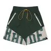 Мужские шорты летние высококачественные логотип панели Rhude Короткие женщины -дизайнеры брюки движущиеся брюки модные пляжные брюки a3 a3