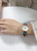 Orologi da polso 2023 Orologio da ragazza Versione coreana da donna Ins Studenti delle scuole medie di nicchia Cintura temperamento semplice al quarzo