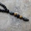 Collane con ciondolo Design Ematite da uomo nera naturale che intaglia Collana di perline di Buddha Goccia di gioielli di moda