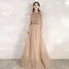 Runway Dresses Fashion Champagne Gold Celebrity Halter Tassel Beading Sequined A Line Sleeveless Quinceanera Evening Prom Gowns Custom