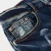 Jeans da uomo High Street Fashion Uomo retrò blu scuro elasticizzato skinny fit in pelle strappata pantaloni di marca hip hop firmati