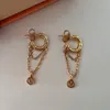 Créateurs de boucles d'oreilles en or clou de diamant avec logo Boucles d'oreilles officielles pour femmes en or 18 carats V lettre Never Fade