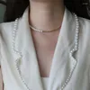 Choker Titanium Natural Pearl Necklace Kvinnor Rostfritt stål Jycken Designer T Show Runway Party Gown Wedding Japan Korean