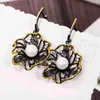 DreamCarnival 1989 Lotus Flower Earrings Hollow Created Pearl CZ Black Gold Color Hip Hop Pendientes tipo gota Parties Jewelries 23422