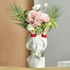 Wazony żywicy poroża dziewczyna Mały wazon prosty styl ludzka twarz wazon dekoracja salonu sypialnia Kwiat Suszony kwiat dom 231120