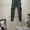 Męskie łatki męskie spodni cargo designer ds. Big Kieszonkowe spodnie Track Sweatanty Pantpants Leggins Long Sports ModersMBKA 690 468