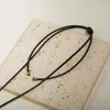 Collares colgantes Collar de corazón hueco Color oro Amor Gargantilla Cuello Vintage Anudado Cuerda de cera negra Ajustable Hombres Cadena Joyería gótica