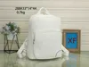 Varumärke Nytt läder ryggsäck herr- och kvinnors ryggsäck stor kapacitetsbrev stämplar resväska skolväska datorpåse 33x14x44cm