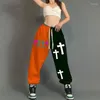 Kvinnors byxor kvinnor hip-hop casual sports-blockerande byxor europeiska amerikanska street tröjor korstryck jazzdans leggings