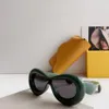 Lunettes de soleil ovales jaunes épaisses pour femmes, nuances de fête à la mode, lunettes de soleil de styliste Sonnenbrille UV400 avec boîte