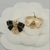 10a Multi-achtige vergulde vergulde boog Druipende Oil Stud-merkontwerper Geometrie Beroemde dames Crystal Rhinestone oorbellen Huwelijksfeestje sieraden