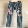 2023 męskie spodnie jeansowe pranie zgrywanie główna ulica detale moda kolano czarne 22 wyszywane litery męskie szczupłe motocyklowe dla mężczyzn Vintage Distressed Denim Jean Pants