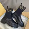 2024 Hiver Marque élégante Domino Bottines Femmes Cuir de veau noir Bouts ronds Semelle en caoutchouc Botte de motard Top qualité Robe de soirée Bottines de marche Confort Chaussures