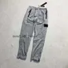 Stones Island Brand Designers Pants Stone Metal Nylon Pocket Badge Casual Trousers Thin Reflective 929 165