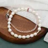 Strand Pearls Pink Crystal Stretch Armband för kvinnliga smycken Set Cross Christ Apprentice Original Design Sweet String Gift