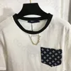Sweat-shirt décontracté imprimé de poche pour femmes, chemise de sport ample de styliste, chemise classique à chaîne, chemisier à manches courtes