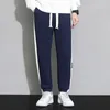 Calças masculinas High Street Cônico Stripe Pacote Pés Mid-Cintura Micro Elastic Sports Casual para Adolescentes Primavera e Outono