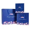 Prezent Wrap Prezent DOT Kwiatowe papierowe torby ślubne Favors Candy Pudełka ręczne makijaż makijaż świąteczne zapasy upuść dostaw