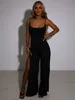 Jumpsuits voor dames rompers articat sexy backless high spleit verbat dames jumpsuits witte spaghetti strap elegante jumpsuit vrouwelijke zomer slanke feest clubkleding p230419