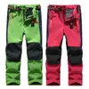 Byxor Spring Windproof Waterproof Children Outdoor Kids Pants pojkar flickor mjuka skalbyxor varma tonåringar klättrar byxor svettbyxor 231120