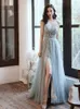 Runway Dresses Blue Celebrity A-Line Split Fork Beading Spaghetti Strap Tulle Sexig röd matta Floral Print Party Evening Gowns Elegant