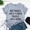 T-shirt da uomo Non fragili come una bomba di fiori Maglietta da donna Top Camicia divertente casual per Lady Yong Girl Top Tee Pantaloni a vita bassa Abbigliamento