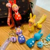 الجملة الكرتونية مفتاح مفتاح Buckle Bag Car Handmade Handmading Man Woman Loves Pass Pass PVC Bubble Girl Doll Accessories