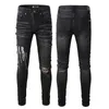 Mäns jeans svarta streetwear ihåliga ut skadade hål denim byxor trycker bokstäver broderpattern tryckt mager sträcka