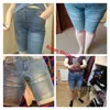 Kvinnors shorts sommaren hög midja denim blå bodycon knä längd elastisk smal pass klassisk 2023 stil 230419