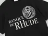 Designer Fashion Clothing Tees Hip Hop Tshirts Rhude Mens Simple Printing Populante Summer Womens Coppia SEGGIO Coppia di cotone puro Maglietta a manica a manica Streetwear