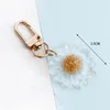 Keychains Dayoff Korea adorável resina Flor Keyring para mulheres joias de joias transparentes margaridas carros -chaves do presente K99