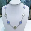 Collar de diseñador de trébol de hoja de lujo, joyería de cadena para mujer elegante y clásica con diamantes brillantes de piedra púrpura