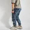 Jeans da uomo pesanti casual raggruppati pantaloni cargo multitasche alla moda autunno e inverno