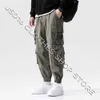 Pantalon Homme Homens carta impresso calas hip hop joggers calas masculinas dos homens slido multibolso carga calas moletom algodo t camisa tanque J230420