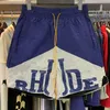 Дизайнерская одежда короткая повседневная Rhude Sports Повседневные шорты Мужские летние сращенные контрастные цвета Быстросохнущие пляжные нейлоновые капри Пары Бегуны Спортивная одежда