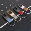 Nyckelringar Fashion Leather Keychains Metal Nyckelkedjor Ringar Söta bilknapparhållare Charmväska gåvor för kvinnliga män Tillbehör Handgjorda 231120
