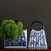 Vasos jingdezhen vaso de cerâmica criativo bolsa design chinês azul e branco porcelana sala de estar arranjo de flores decoração de mesa