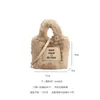 Handbags autumnwinter fashion plush bucket wool bag high-grade texture hand-held children bag cute and warm 231121