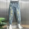Herr jeans foufurieux rippade män kläder lösa sträcka hög midja manliga denim byxor överdimensionerade vintage jean byxor harajuku 231121