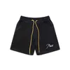 Roupas de grife shorts casuais curtos Rhude com cordão para rua alta marca da moda solta casual verão masculino feminino shorts americanos praia capri joggers roupas esportivas