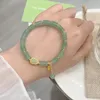 Braccialetti con ciondoli Bracciale con zucca di giada naturale per donna Lussuosa perla di pietra elastica con accessorio per mano di arrivo dell'abaco