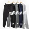 Calças masculinas primavera outono algodão esporte grande ajuste solto versátil quatro barras sweatpants moda casual lápis