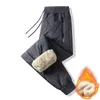 Pantalones de hombre de talla grande 7XL, pantalones de chándal gruesos impermeables y resistentes al viento, pantalones elásticos informales para hombre, Jogger de lana cálido para invierno