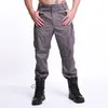 Calça masculina calça tática militar masculina calça exército de desgaste de desgaste a desgaste de desgaste de desgaste de roupas masculinas machos machos de rua múltiplos bolsos da calça s-5xl 230420