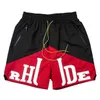 디자이너 의류 짧은 캐주얼 Rhude Shorts American High Street Trend 브랜드 스 플린트 대비 대비 대규모 레터 남성 여성 느슨한 카프리스 조깅스 스포츠웨어 jlr