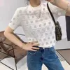 デザイナー女性の Tシャツ中空女性のニット Tシャツファッション新レトロレリーフ中空デザイン F アイスシルク半袖トップ 2023