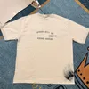 メンズTシャツメンTシャツファッショングラフィティスプラッシュインクプリント半袖Tシャツ夏洗浄